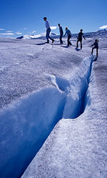 tourists hiking on an Alaskan glacier. Photo by Arizona photographer Don B. Stevenson